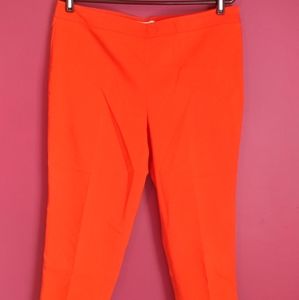 High waisted, orange ankle cropped pants